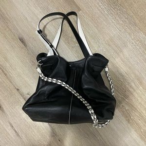 Michael Kors black tumbled leather bucket bag with white straps